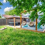 Uptown Oasis, Hot Tub, Swing Chairs, Fire Pit, Gazebo