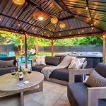 Uptown Oasis, Hot Tub, Swing Chairs, Fire Pit, Gazebo