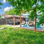 Uptown Oasis, Hot Tub, Swing Chairs, Fire Pit, Gazebo