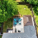 Uptown Oasis, Hot Tub, Swing Chairs, Fire Pit, Gazebo