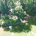 Embrace Nature In This Lakefront Cottage With Fire Pit In Charlotte, North Carolina