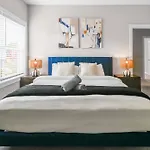 Spacious 3-Bedroom Home With Workspace Near Uptown & Airport