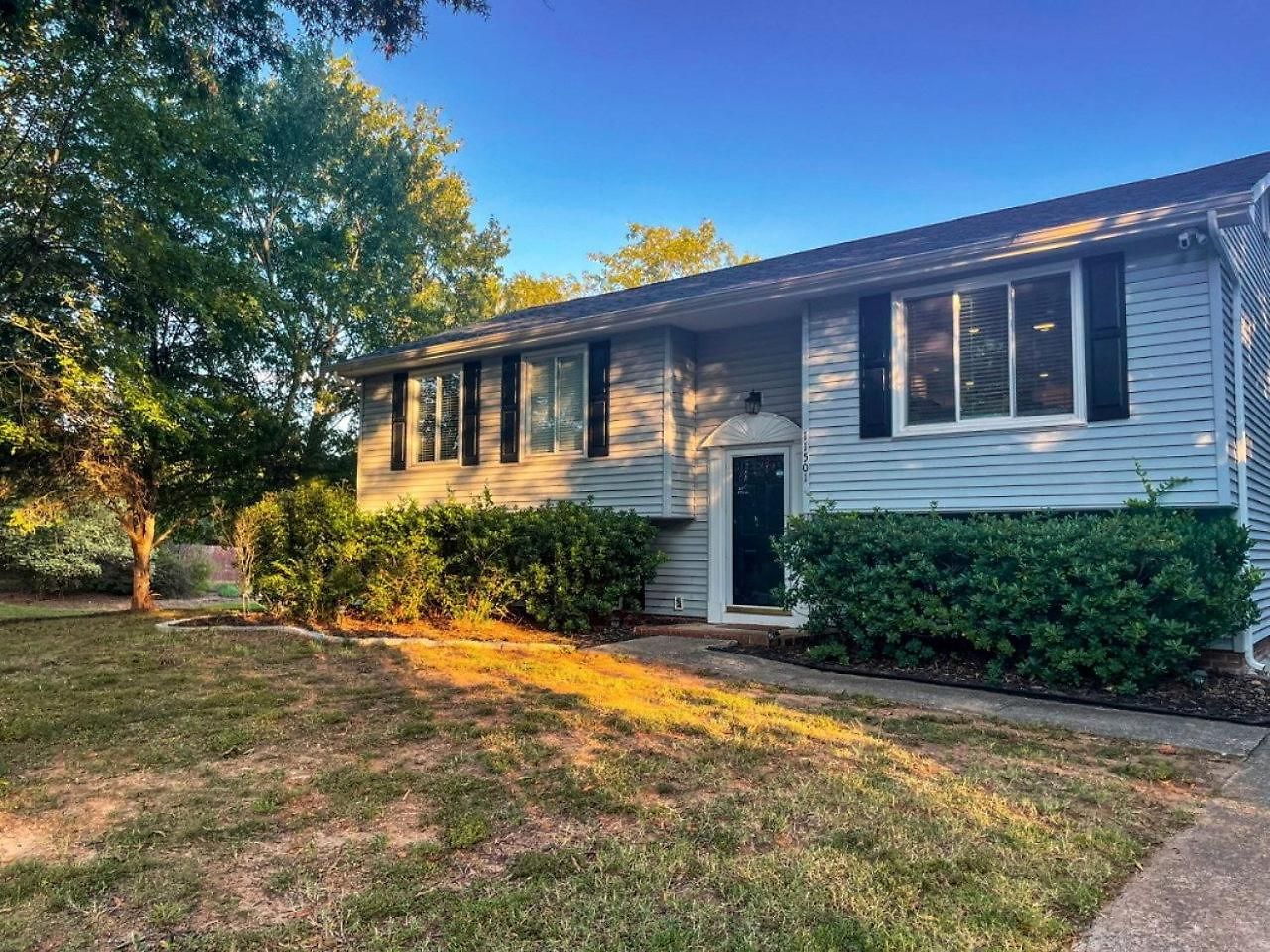 Family With Outdoor Living Areas And Foosball Table In Nc