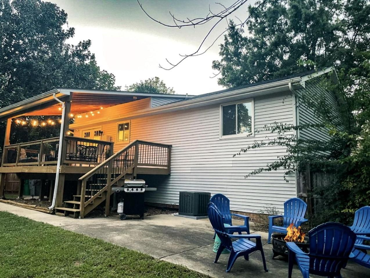 Family With Outdoor Living Areas And Foosball Table In Nc Charlotte