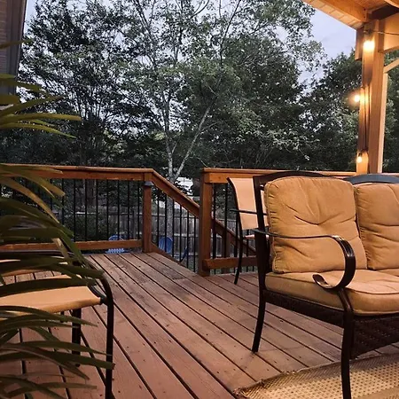 Family With Outdoor Living Areas And Foosball Table In Nc