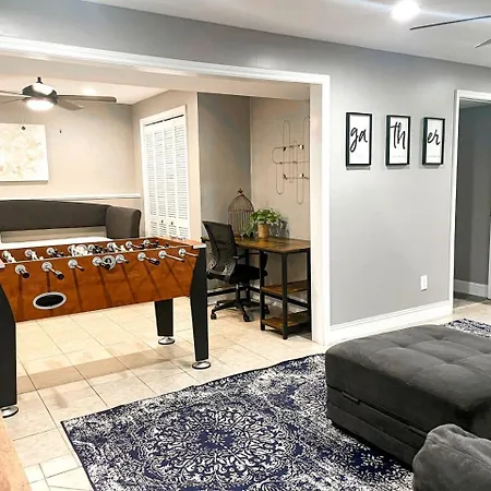 Family With Outdoor Living Areas And Foosball Table In Nc Charlotte