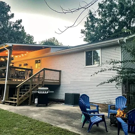 Family With Outdoor Living Areas And Foosball Table In Nc Charlotte