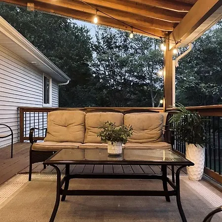 Family With Outdoor Living Areas And Foosball Table In Nc Charlotte