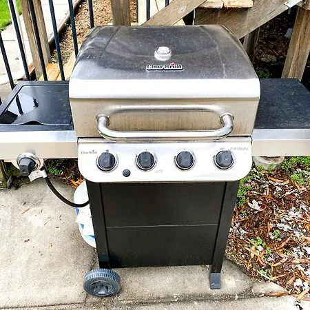 Family With Outdoor Living Areas And Foosball Table In Nc