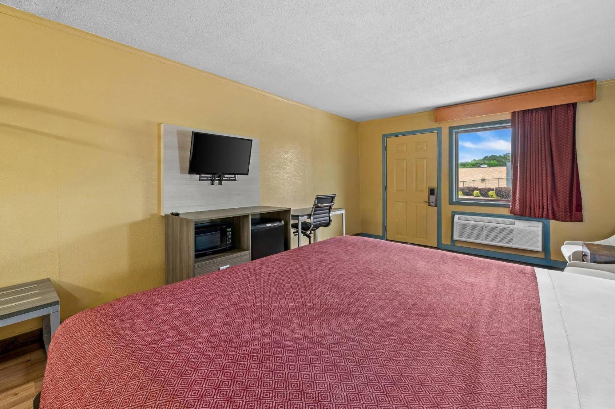 Econo Airport Area Lodge *