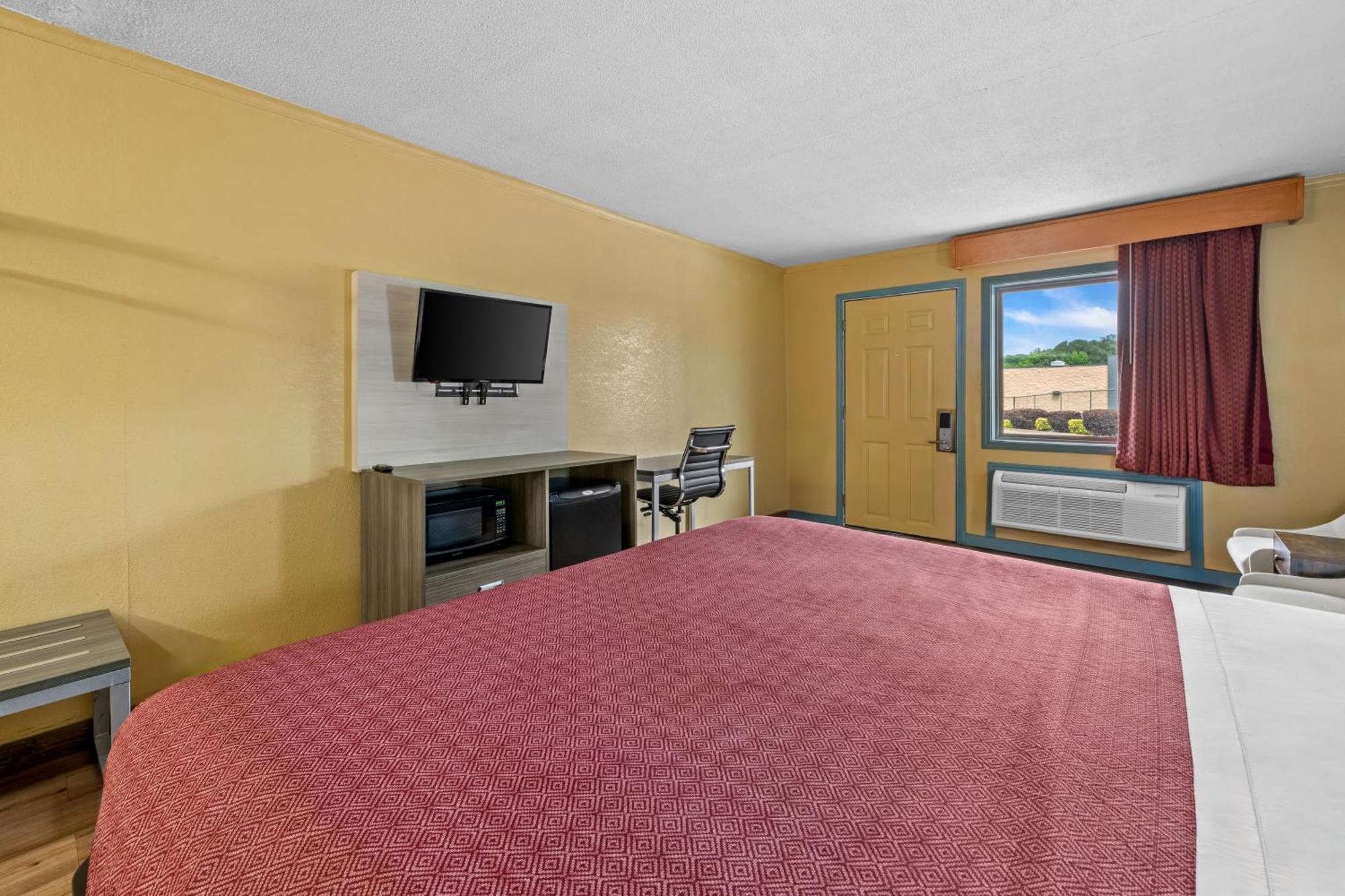 Econo Airport Area Lodge *