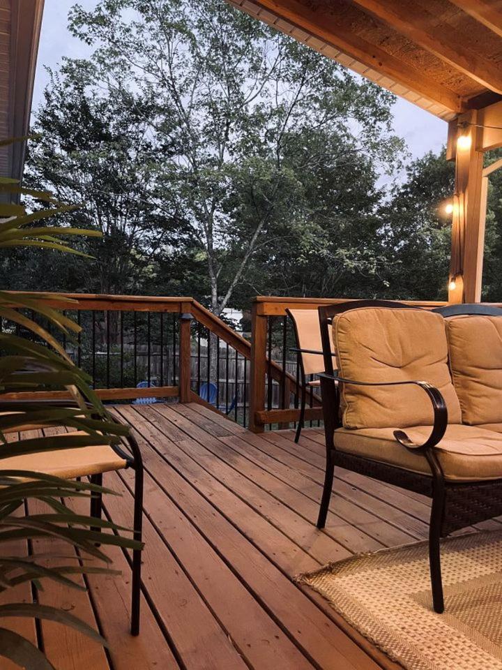 Family With Outdoor Living Areas And Foosball Table In Nc