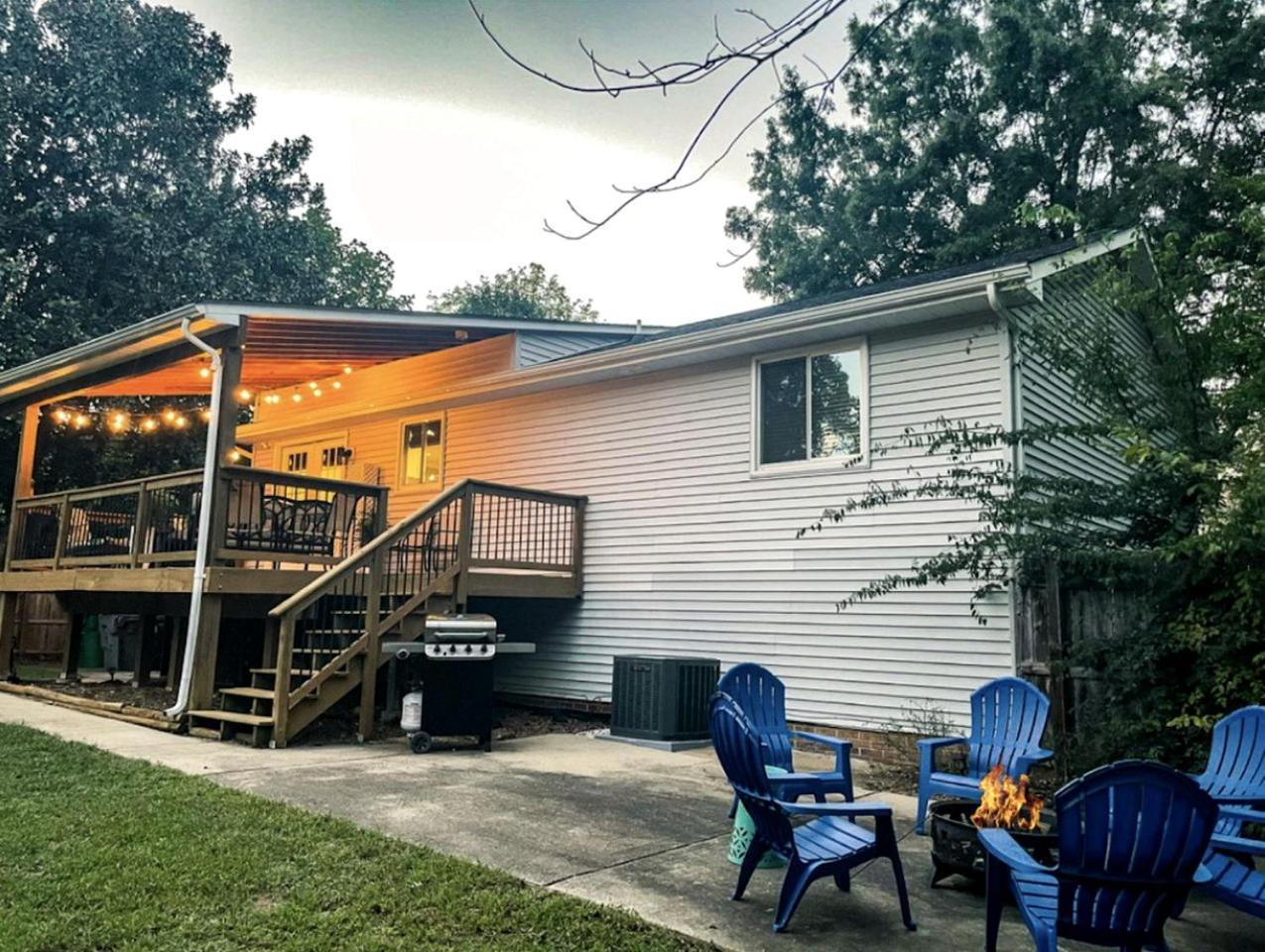 Family With Outdoor Living Areas And Foosball Table In Nc Charlotte